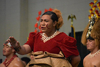 Woman performing in traditional clothing