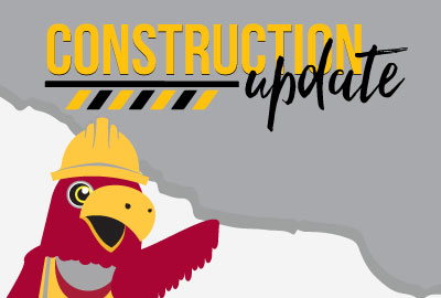 Raider bird in a construction hat under the words construction update