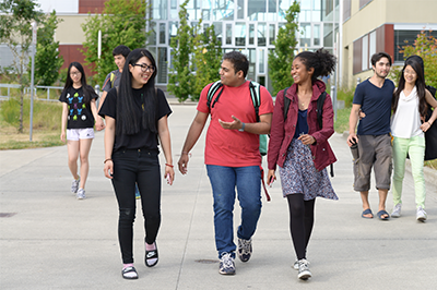 students walking in front of rainer building on fort steilacoom campus