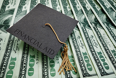 Illustration of graduation cap on top of money