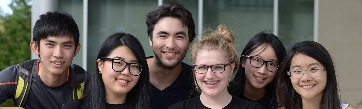 group of smiling international students