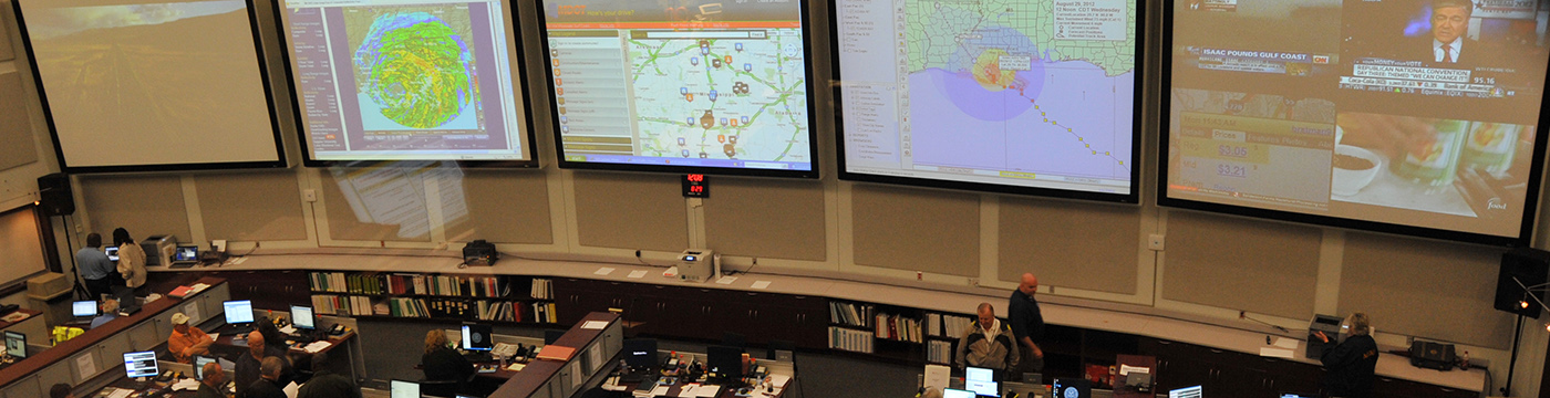 wall of monitors in emergency management center