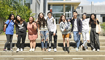 group of international students in front of cascade building