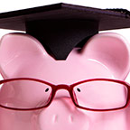 piggybank wearing glasses and a graduation cap