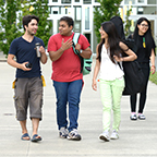 Students walking outside the Rainier building